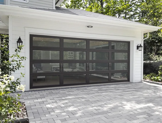 Waterbury Garage Door Repair design specialist presenting custom garage door options to Waterbury homeowner