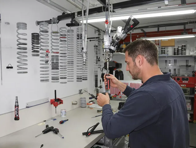 Waterbury Garage Door Repair safety certified technician performing precision spring replacement in Waterbury