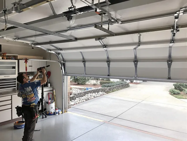 Garage door track repair service by Waterbury Garage Door Repair in Waterbury